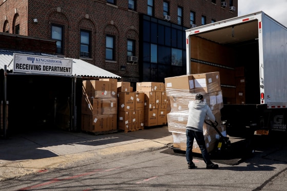 Image: Boxes of N95 masks and Personal Protective Equipment are stacked outside Kingsbrook Jewish Medical Center during the outbreak of the coronavirus disease (COVID-19) in Brooklyn