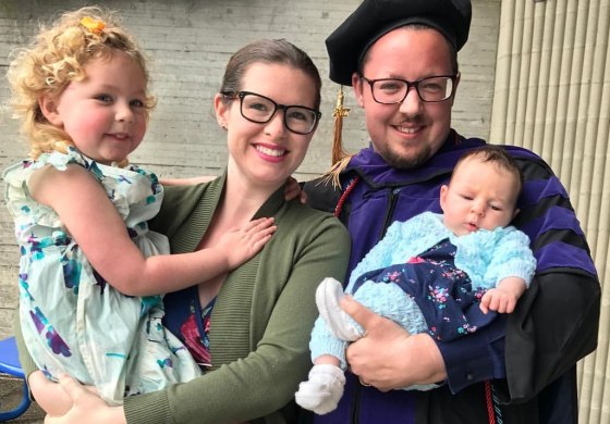 Emmett Hardiman with his wife, Calla, and two daughters.