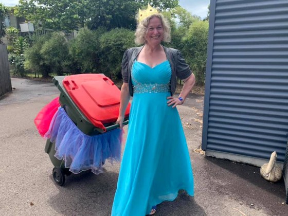 Image: Danielle Askew, 47, says she has a backlog of 18,000 submissions from people who are dressing up to take out the trash.