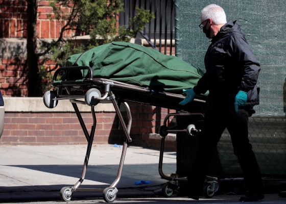 Image: The body of a deceased person is prepared to be transferred at the Brooklyn Hospital Center, during the outbreak of the coronavirus disease (COVID-19) in the Brooklyn borough of New York City