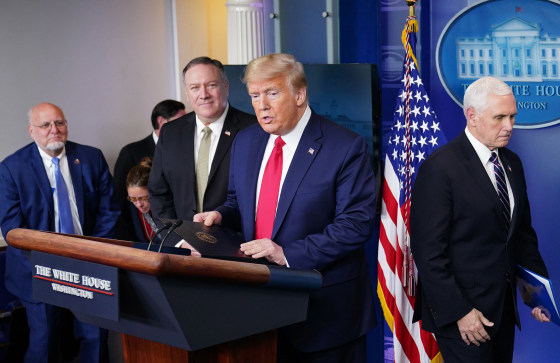 Image: CDC Director Robert R. Redfield, Secretary of States Mike Pompeo, President Donald Trump and Vice President Mike Pence arrive to participate in the daily briefing on the novel coronavirus, COVID-19, in the Brady Briefing Room at the White House
