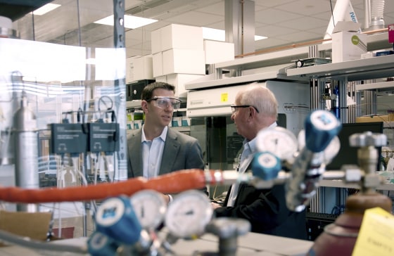 Image: Phlow Corporation CEO Dr. Eric Edwards (left) speaks with company co-founder Dr. Frank Gupton