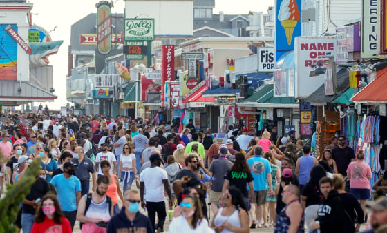 Image: Visitors crowd the boardwalk on Memorial Day weekend in Ocean City, Maryland