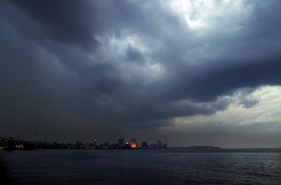 Image: Dark clouds hang over the city ahead of cyclone Nisarga making landfall in Mumbai, India