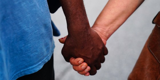 Image: Clasp hands, Atlanta Protest Held In Response To Police Custody Death Of Minneapolis Man George Floyd