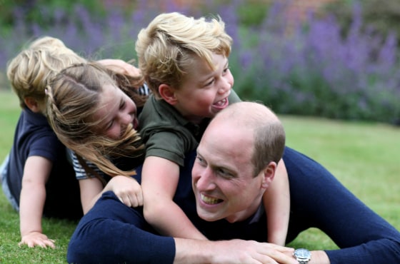Image: Prince William plays with Prince George, Princess Charlotte and Prince Louis in Norfolk in June 2020.