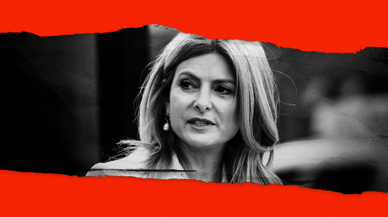 Image: Lawyer Lisa Bloom in between tears of red paper.