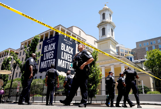 Image: Metro Police monitor Black Lives Matter Plaza amid protests against racial inequality in Washington