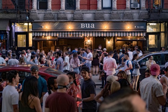 Image: A bar in the East Village neighborhood in New York City on June 12, during the reopening phase of the city's coronavirus outbreak.