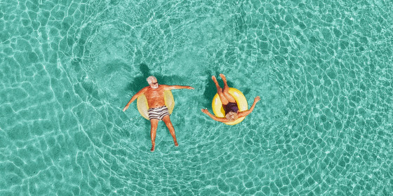 Senior couple enjoy sea water