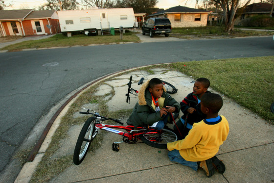 Image: A few children have returned to Pontchartrain Park neighborhood with their parents