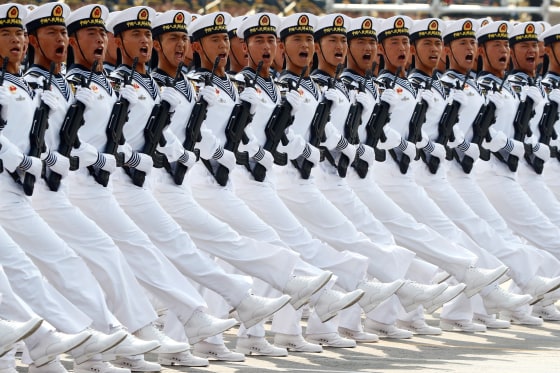 Soldiers of People's Liberation Army (PLA) march in formation during the military parade marking the 70th founding anniversary of People's Republic of China