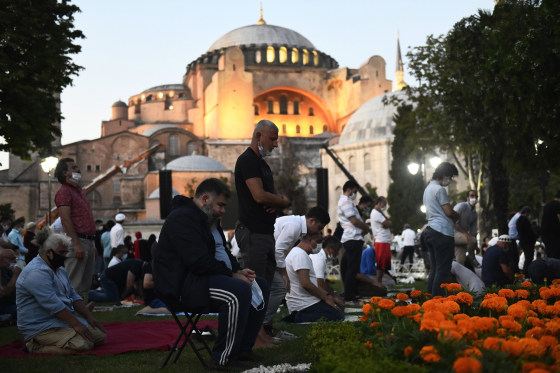 Image: Muslims offer their prayers outside the Byzantine-era Hagia Sophia, in the historic Sultanahmet district of Istanbul.