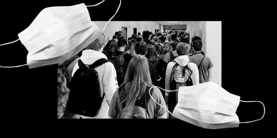 Image: Students at North Paulding High School in Dallas, Ga., crowd in a hallway on Aug. 4, 2020. The district says it is encouraging mask use, but isn't requiring it.