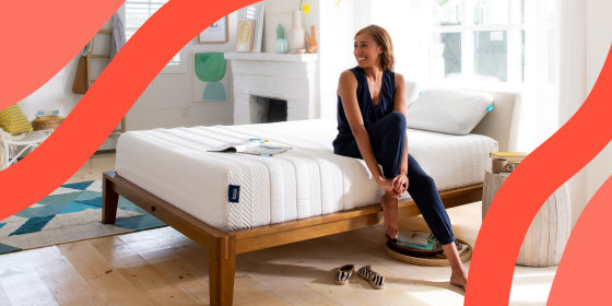 Woman sitting on Leesa mattress in bedroom