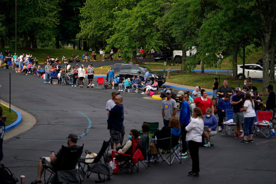 Image: People wait outside Kentucky Career Center in Frankfort
