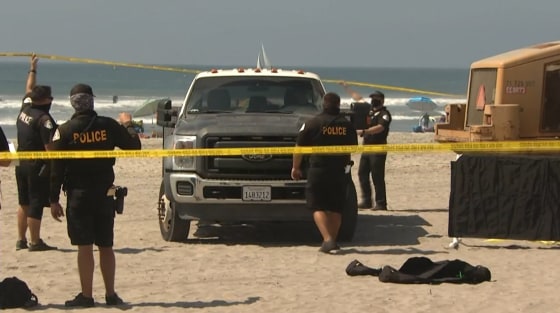 Police respond to a fatal beach accident in Oceanside, Calif., on Sept. 28, 2020.