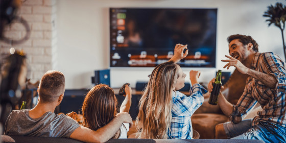 Image: Group of happy people spending their time in the living room.