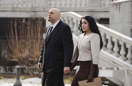 Image: Pennsylvania Lieutenant Governor John Fetterman and his wife Gisele walk to Pennsylvania Gov. Tom Wolf's inauguration,