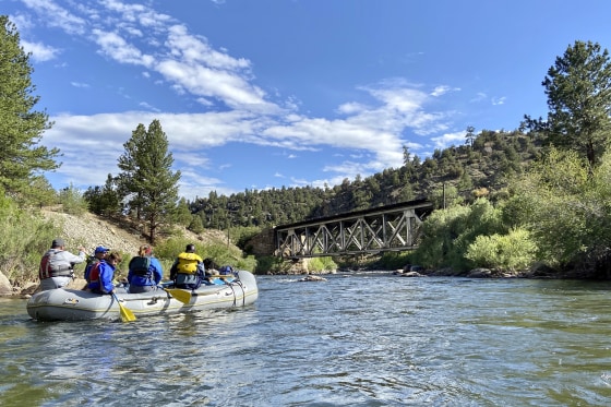Rafters float down the Arkansas River on July 4, 2020, near Salida, Colo.