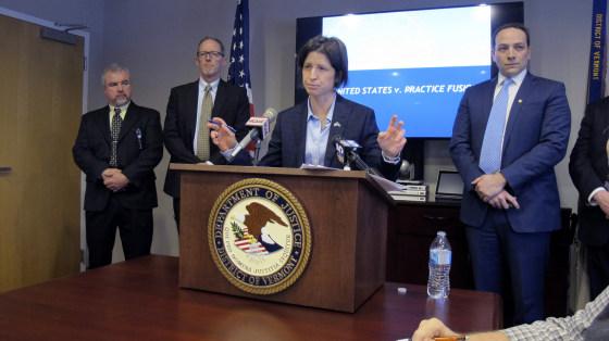 U.S. Attorney Christina Nolan, center, speaks at a news conference in Burlington, Vt., on Jan. 27, 2020.