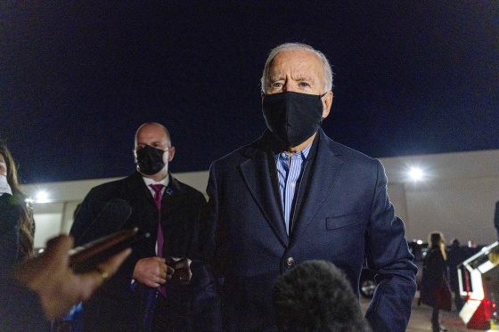 Image: Joe Biden speaks to members of the media before boarding his campaign plane at Detroit Metropolitan Wayne County Airport in Detroit.