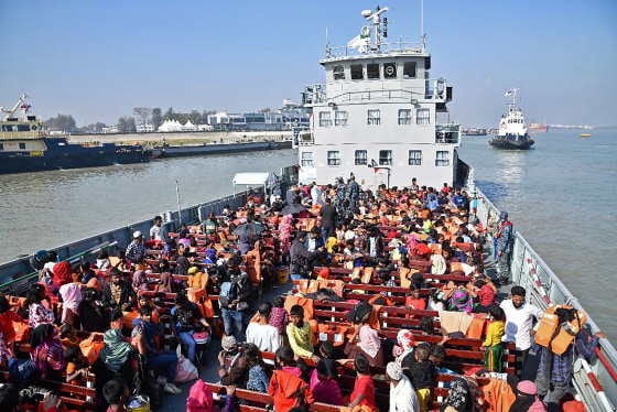 Image: Rohingya refugees are seen on a Bangladesh's Navy ship as they are being relocated to Bhashan Char Island in the Bay of Bengal, in Chittagong