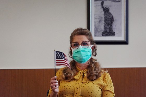 Image: Erlina Padilla, originally from Cuba, during in a swearing in ceremony to become an American citizen in Miami on June 4, 2020.
