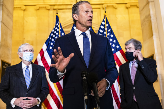 Senate Minority Whip John Thune, R-S.D., talks alongside Senate Minority Leader Mitch McConnell, R-Ky., and Sen. Roy Blunt, R-Mo., on Capitol Hill on March 2, 2021.
