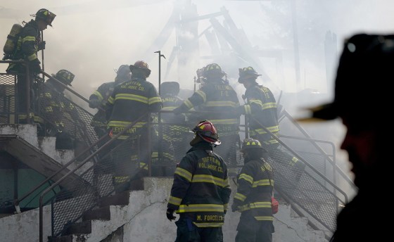 Firefighter #39 s body recovered nearly 24 hours after deadly fire at N Y