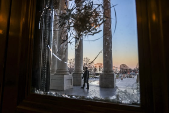Police stand guard at the entrance to the U.S. Capitol on January 12, 2021.