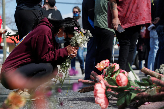 Image: Vigil at a makeshift memorial outside the Gold Spa in Atlanta