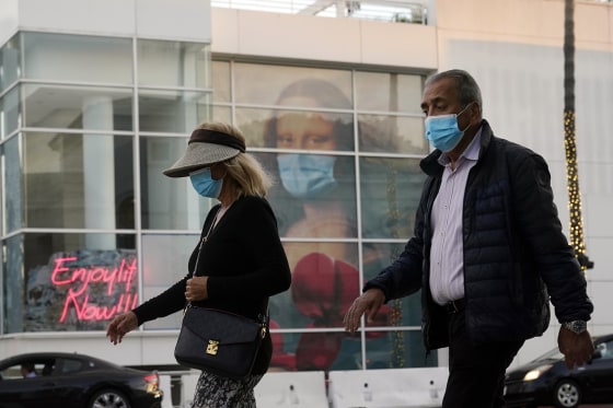 Image: Pedestrians in Beverly Hills, Calif., on Dec. 9, 2020.