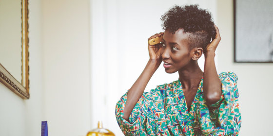 Woman at home doing her hair