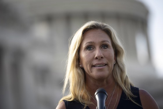 Image: Rep. Marjorie Taylor Greene speaks at a news conference after visiting the Holocaust Museum, outside the Capitol