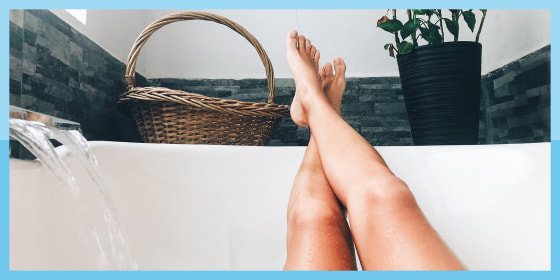 Woman Relaxing At Home In The Bathtub