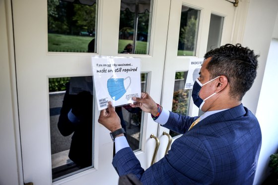 Image: After CDC Revises Mask Recommendations, White House Mandates Use