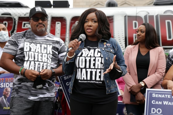 Image: Texas State Rep. Jasmine Crockett, center, at a demonstration on voting rights outside National Museum of African American History and Culture on Aug. 4, 2021 in Washington.