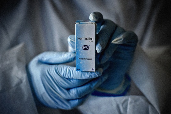 Image: A health worker holds a bottle of Ivermectin in Cali, Colombia, on July 21, 2020.