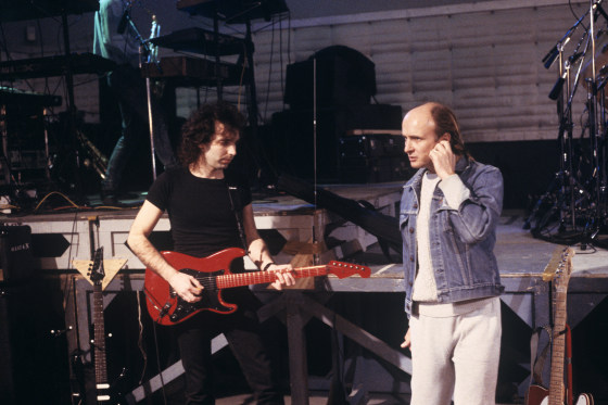 Joe Satriani, left, and his manager Mick Brigden, right, at SIR Studios in New York on Feb. 20, 1988.