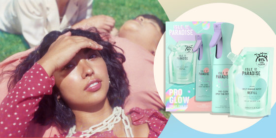 Image of a Young Women Lounging Outside, laying on her friend, blocking the sun out with her hand and the new Isle of Paradise tanning kit