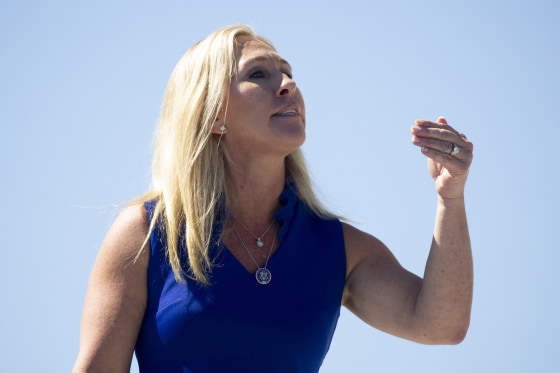 Rep. Marjorie Taylor Greene, R-Ga., shouts at House Democratic Women's Caucus members at the Capitol on Sept. 24, 2021.