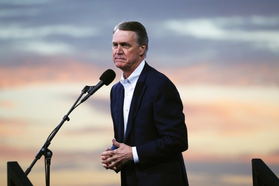 Sen. David Perdue, R-Ga., speaks as President Donald Trump hosts a campaign event with Perdue and Sen. Kelly Loeffler, R-Ga., in Valdosta, Ga., on Dec. 5, 2020.