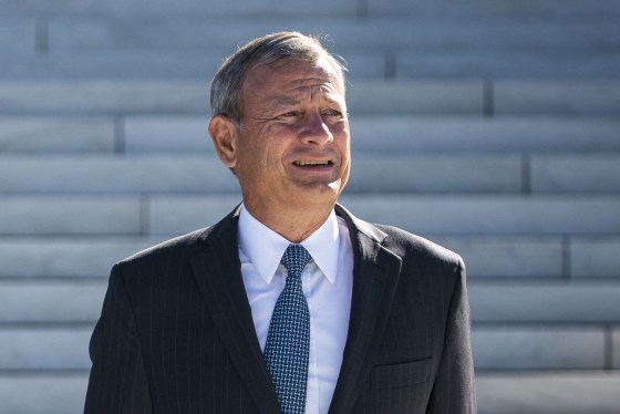 Image: Chief Justice John Roberts at the front plaza of the Supreme Court building on Oct. 1, 2021.