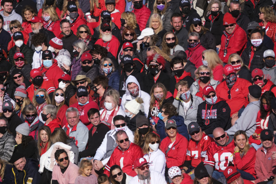 People attend the 133rd Rose Parade in Pasadena, Calif., on Jan. 1, 2022.
