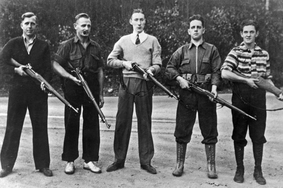 Anti-Semitic Group Posing with Rifles