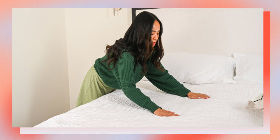 Woman making bed