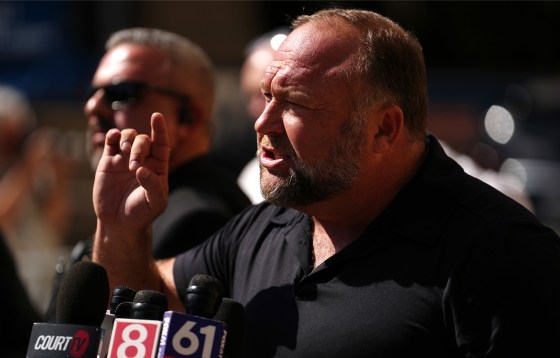 Image: InfoWars founder Alex Jones speaks to the media outside the Waterbury Superior Court during the Sandy Hook trial.