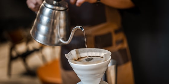 Close up of hand brewing coffee