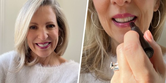 Woman with lip oil and putting on lip oil